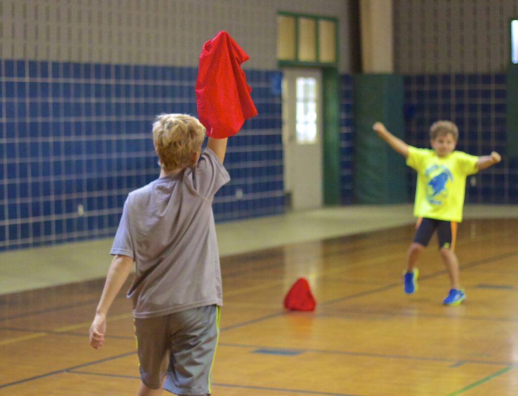Boys Playing Capture The Flag (14980437786)